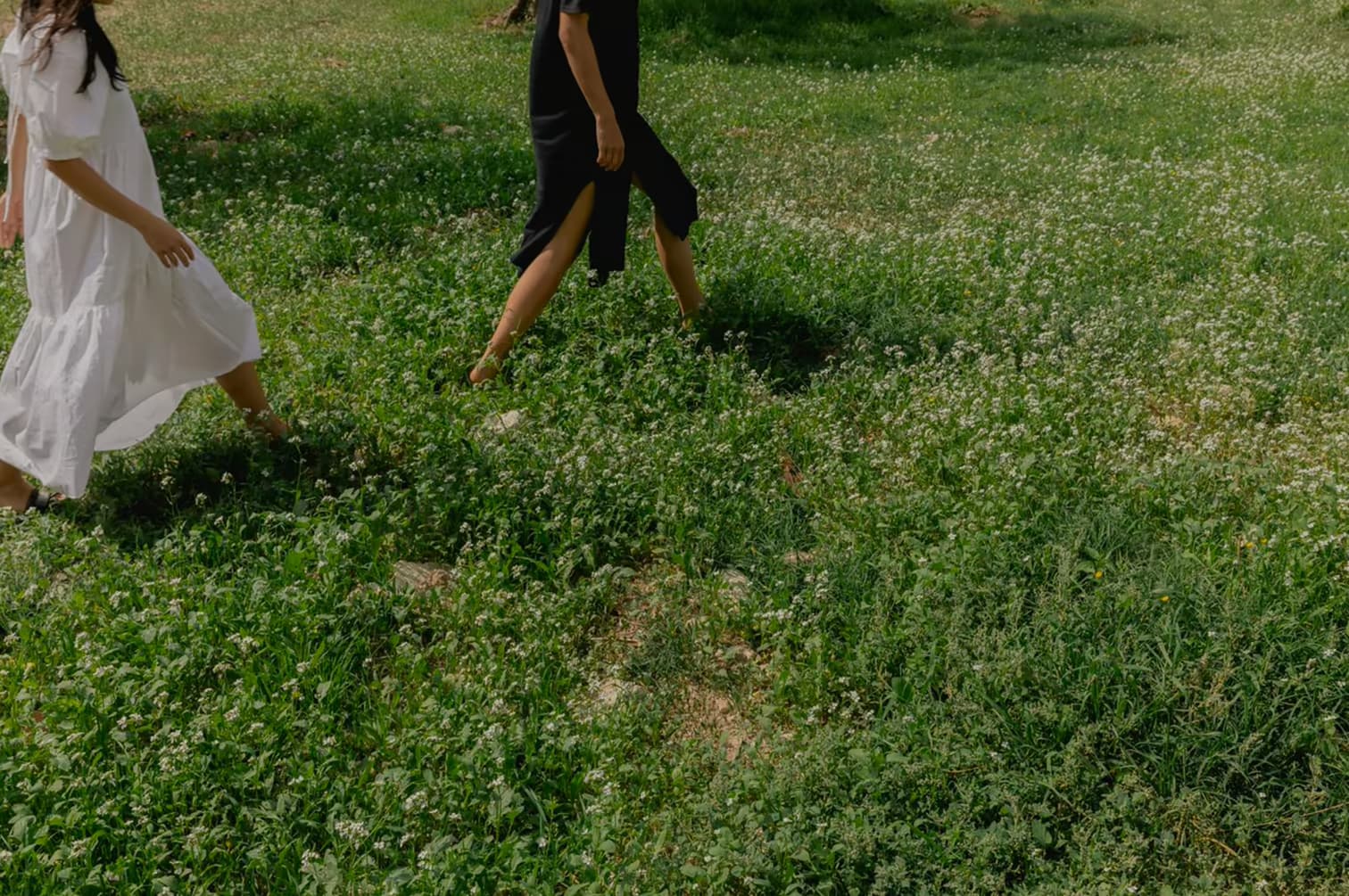 A person walking through a calm landscape